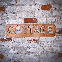 Sign Cottage